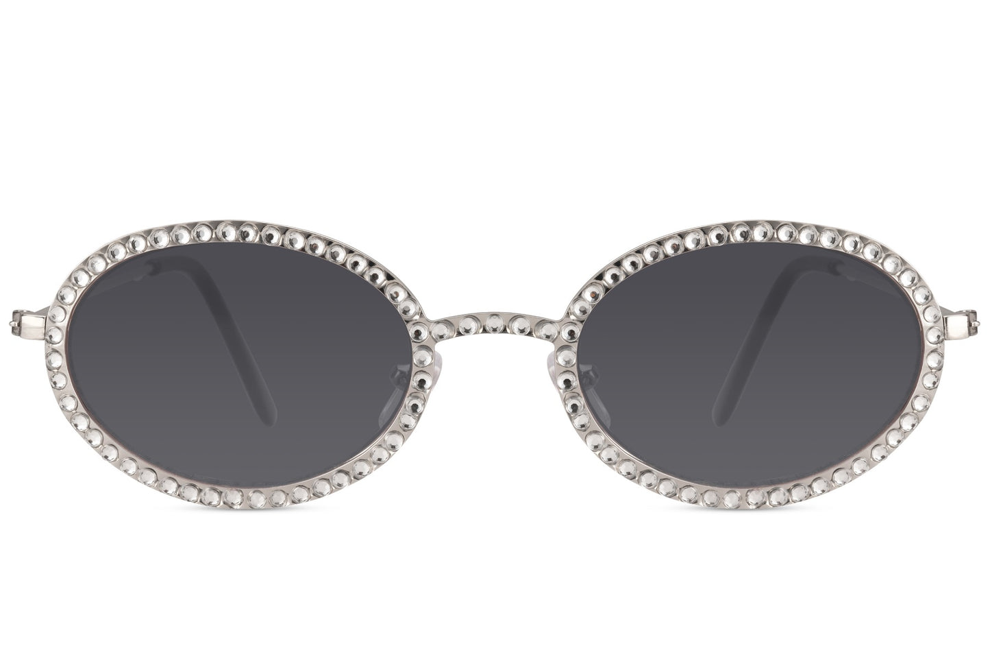 Ovale hurtigbriller med diamantpynt i kanterne, tynde stænger og grå glas set fra fronten