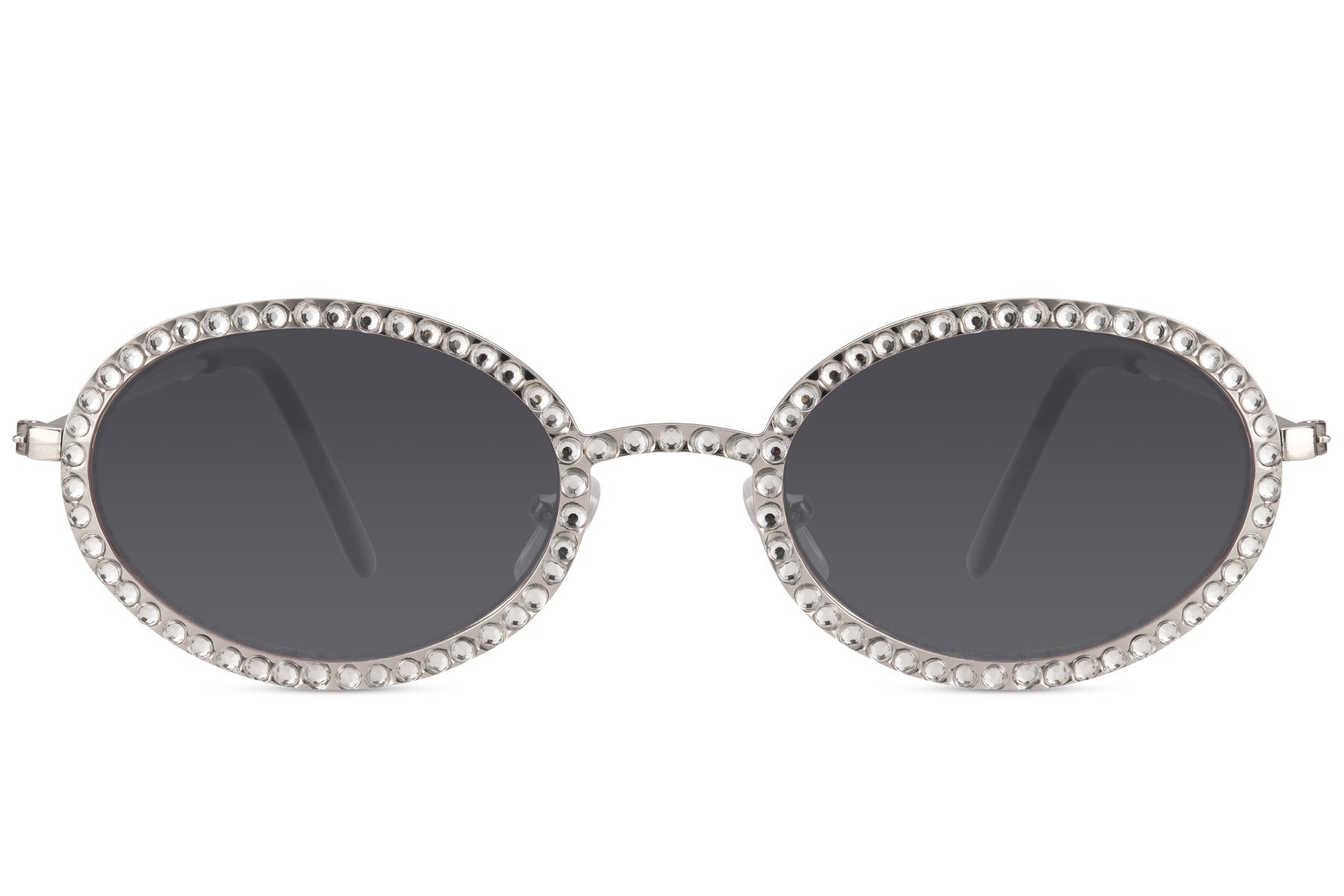 Ovale hurtigbriller med diamantpynt i kanterne, tynde stænger og grå glas set fra fronten