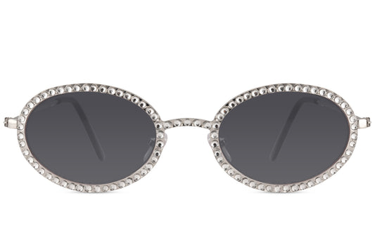Ovale hurtigbriller med diamantpynt i kanterne, tynde stænger og grå glas set fra fronten
