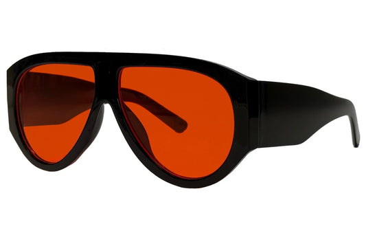 Rød og sort hurtigbrille med store runde glas og tyk stel set fra siden