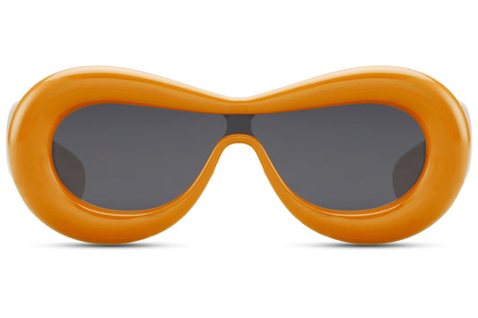 Tykke ovale hurtigbriller med ét glas og orange stel set fra fronten