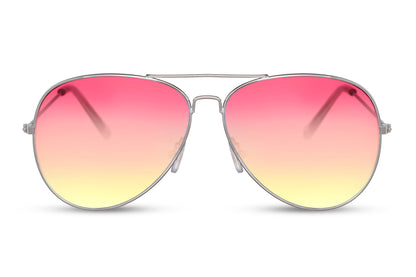 Hurtige aviator solbriller i røde og gule glas set fra fronten