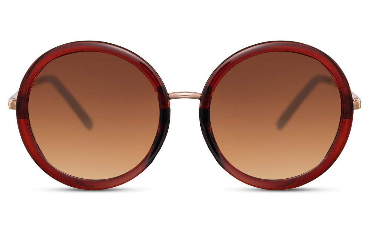 Kvinde solbriller med runde glas og rød ramme set fra fronten