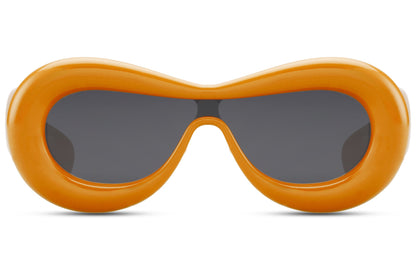 Tykke ovale hurtigbriller med ét glas og orange stel set fra fronten